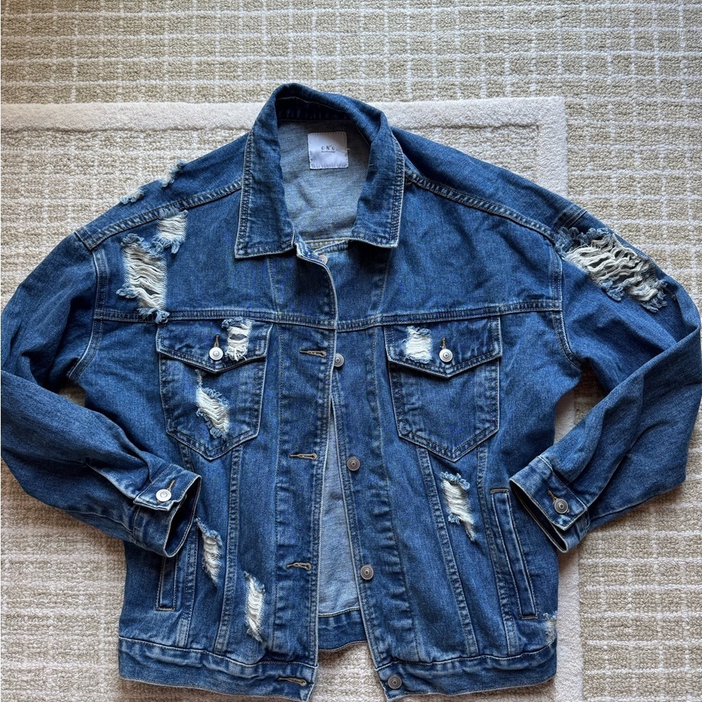 Distressed oversized blue jean jacket